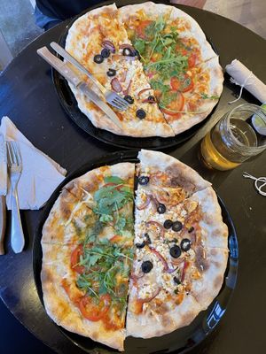 Splitted pizzas  at Odete Bakery in Porto