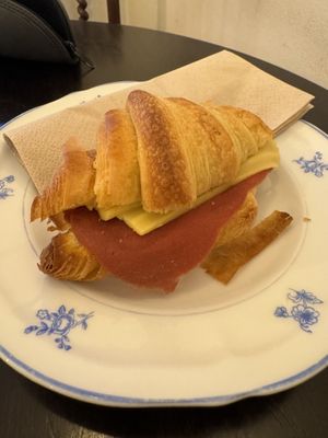 Croissant with cheese and ham   at Odete Bakery in Porto