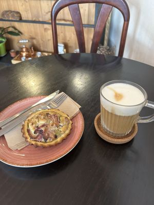 Quiche and Latte  at Odete Bakery in Porto