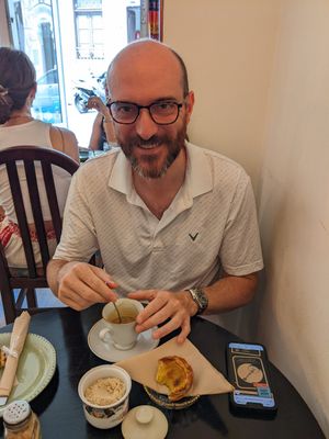 "Egg" tart and coffee at Odete Bakery in Porto