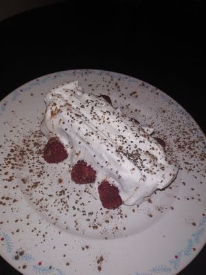 Guava cake with raspberries at Odete Bakery in Porto