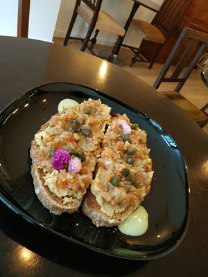 Eggplant spread on toast with capers at Odete Bakery in Porto