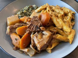 Brown stew. Spinach. Gf Mac n chz   at Desmond's Island Soul Grill in Virginia Beach