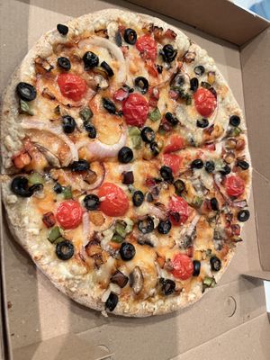 Vegan Greenhouse Pizza
Onion, Cherry Tomato, Mixed Bell Pepper, Black Olive, Mushroom, Vegan cheese   at NKD Pizza in Abu Dhabi