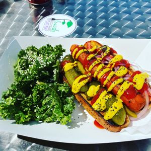 The Carrot Dog and Kale Sesame Miso Salad at Flourish Plant-Based Eatery in Evansville