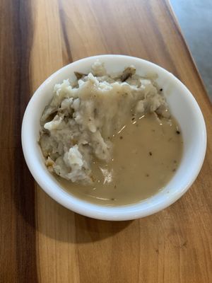 Mashed potatoes with gravy. Just okay nothing too crazy  at Flourish Plant-Based Eatery in Evansville