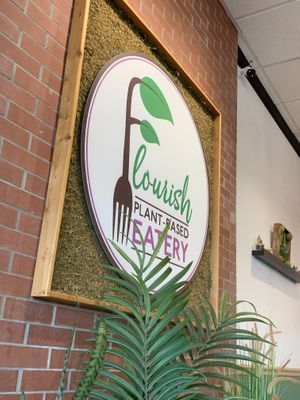 Sign at Flourish Plant-Based Eatery in Evansville