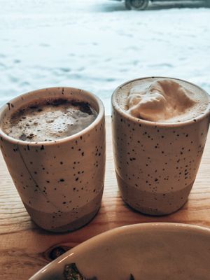 Coconut milk coffee and white chocolate peppermint hot chocolate made on oat milk at The Kind Cafe  in Whitehorse