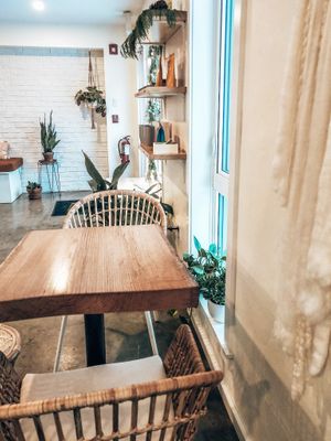 Small amount of tables and chairs to eat in at The Kind Cafe  in Whitehorse