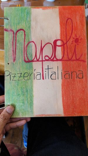 Menu cover at Pizzeria Napoli in Puerto Natales