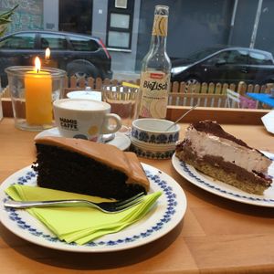 Chocolate cake with peanut frosting (left) - chocolate mousse + cherry (right) at Be Nice in Hannover