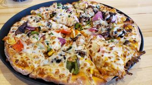 10" vegan lover pizza ($13). Nice job with the Daiya cheese (usually doesn't melt well). Good sauce flavor. at Pizza Karma in Maple Grove