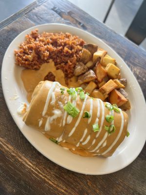 Breakfast burrito smothered in queso  at The Fix in Kansas City