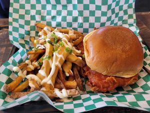 Fried chicken sandwich with loaded fries at The Fix in Kansas City
