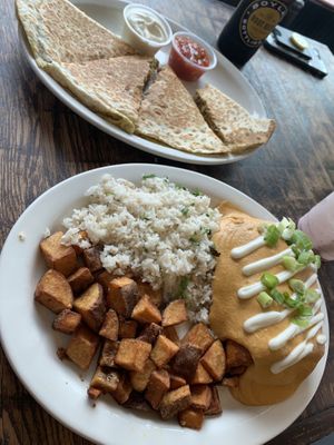 chicken quesadilla and fried burrito omnomnomnomnom!!!!  at The Fix in Kansas City