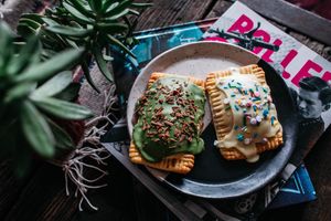 Coconut cream with matcha icing & raspberry with lemon icing  at New Tradition Co in Worcester