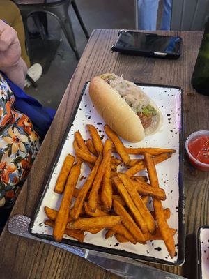 Vegan brat, sweet potato fries  at The Annex Crafthouse in Houston