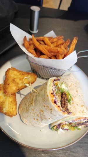 Smoked tempeh wrap meal with extra hash   at Pure Vegan in Lancaster