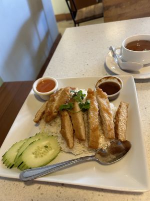 KHO MUN GAI
Deep fried battered chicken with ginger garlic rice, tamarind black bean sauce served with cucumber slices  at Salaya in Los Angeles