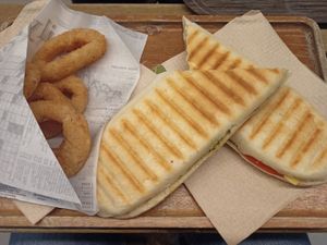 Panini and onion rings at Loving Hut in Louvain-la-neuve