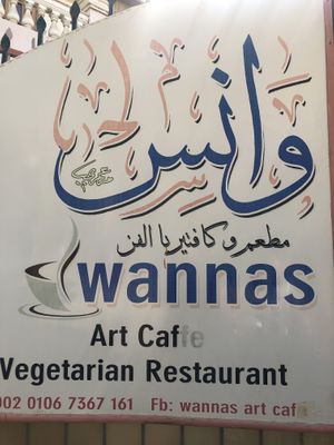 Outside signboard at Wannas Art Cafe in Luxor