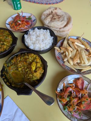 curried cauliflower with rice, fried potatoes, salad and bread  at Wannas Art Cafe in Luxor