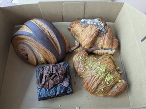 Chocolatine (top left), hazelnut croissant (top right), brownie (bottom left) and pistachio croissant (bottom right) at W.H.I.P Patisserie in Inglewood