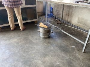 Bàhn My roasting on charcoal grill at Huong Sen in Tam Ky