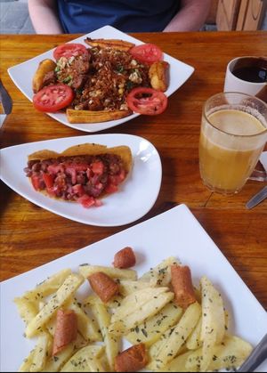 Chaulafan (on thr top), tacos vegan and salchipapas (bottom) at Govinda Gopal - Govindas  in Quito