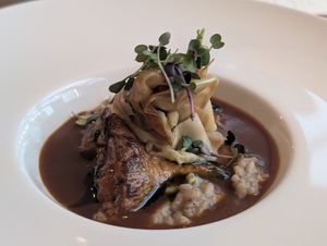 Mushroom risotto topped with shaved celeriac at Paradiso Pure Living Vegan Hotel in Kastelruth