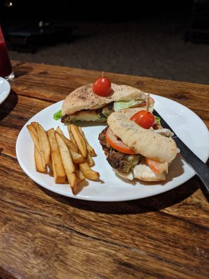 Vegan burger and chips at Chia Lounge in Morjim