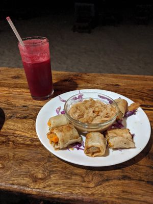 Spring rolls with satay sauce at Chia Lounge in Morjim