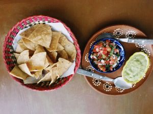 Totopos de maíz con pico de gallo y salsa  at Colores Y Sabores in Cozumel