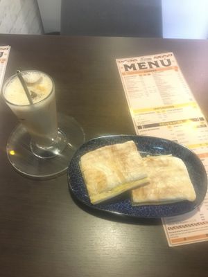 Cafe frio, 3 cheese sandwich  at Canela y Miel in Quepos