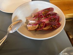 Serving to share with partner   at Neue Taverne in Zurich