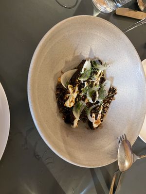 Serving to share with partner   at Neue Taverne in Zurich