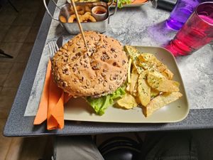 Black bean burger, lobes the french fries at Vegan Box in Faro