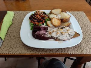 Seitan steak with veggies. at Vegan Box in Faro