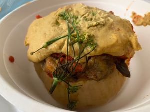 Stuffed butternut squash with cashew cheese sauce at The Organic Deli & Market in Buenos Aires