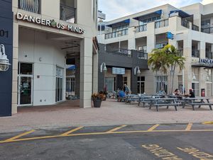 Entrance and outdoor seating  at Dangerous Minds Brewing Co in Pompano Beach