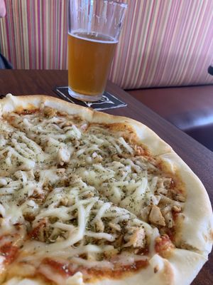 Pizza with oomph sausage and Violife cheese at Dangerous Minds Brewing Co in Pompano Beach