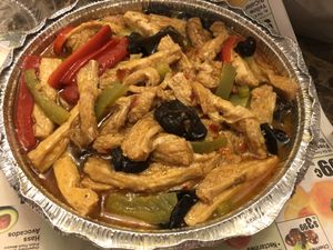 Shred vege meat with spicy sweet sauce /brown rice  at Amitabha Vegan in Fresh Meadows