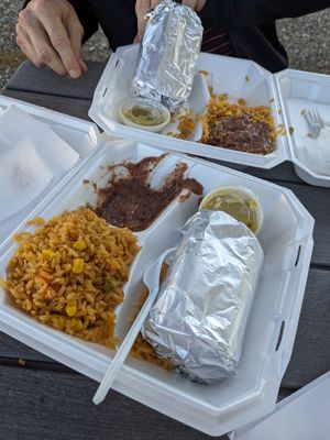 2 vegan tamales with rice and beans. Mild salsa = salsa verde. Everything was delicious! Definitely recommend. at Tamales Plus in Holland