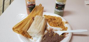 Full vegan meal. 1 tamale already eaten! at Tamales Plus in Holland