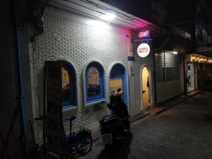 Look for the blue door at Sugam Vegetarian in Bangkok