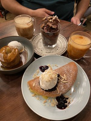 3 vegan desserts and 2 milky chais  at Eggless Dessert Cafe in Goodwood