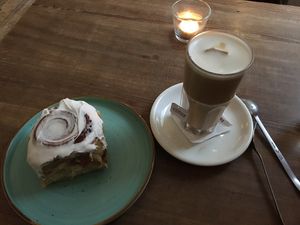 cinnamon bun with dirty chai latte  at Cafe Vux in Berlin