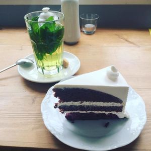 Fresh mint tea & cocoa cherry cake :) at Cafe Vux in Berlin
