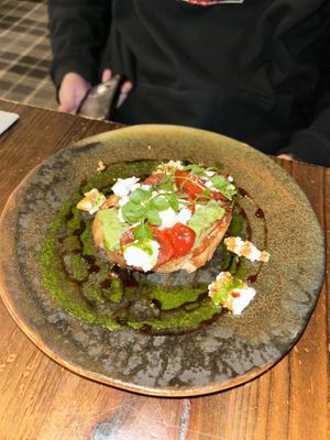 Pea guacamole, sourdough toast, oven dried tomatoes & crumbled almond feta  at Nant Y Felin in Denbigh