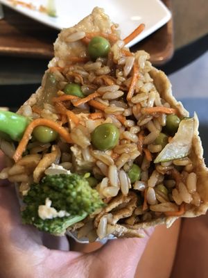 Teriyaki burrito with extra tofu  at freshii in Lima